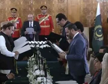 President administers oath to new federal, state ministers