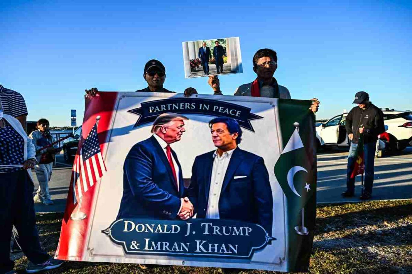 A PTI workers waives US flag at the party's rally in Swabi, on November 9, 2024. ( Reuters )