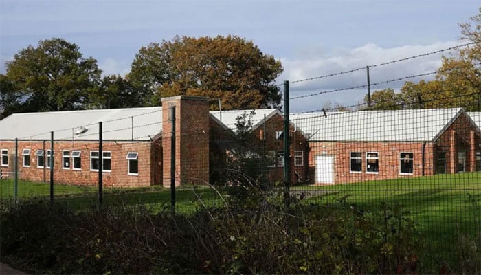 UK Transfers Asylum Seekers to Former Military Barracks Amid Controversy
