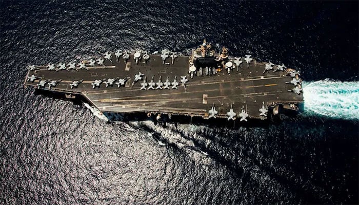 Iran Responds to US and Israeli Strikes with Missile Attacks on American Aircraft Carrier
